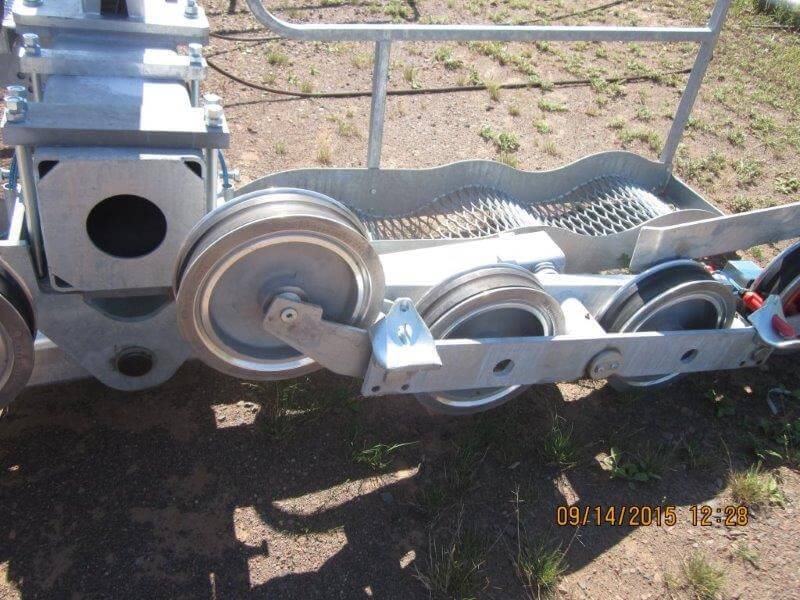 A close-up view of the pulley system guiding the gondola cables