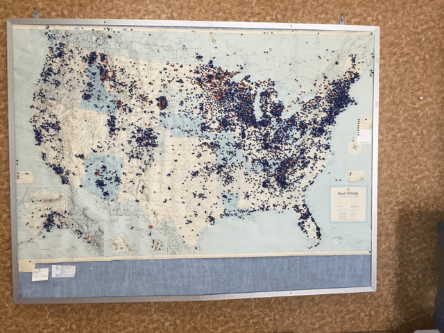 Mike McLynn helping a customer at the Auto Electric, LLC counter