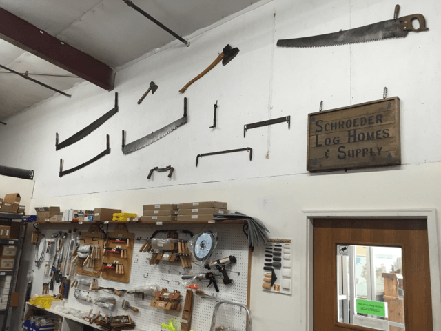 Christy Martindale operates the heat press that applies images or vinyl lettering to garments.