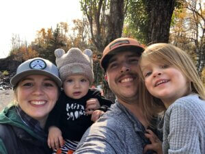 Stephanie Gambill pictured with her two children and husband.
